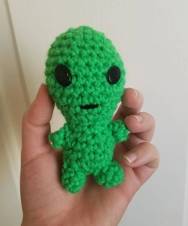 Alien cuddly store toy