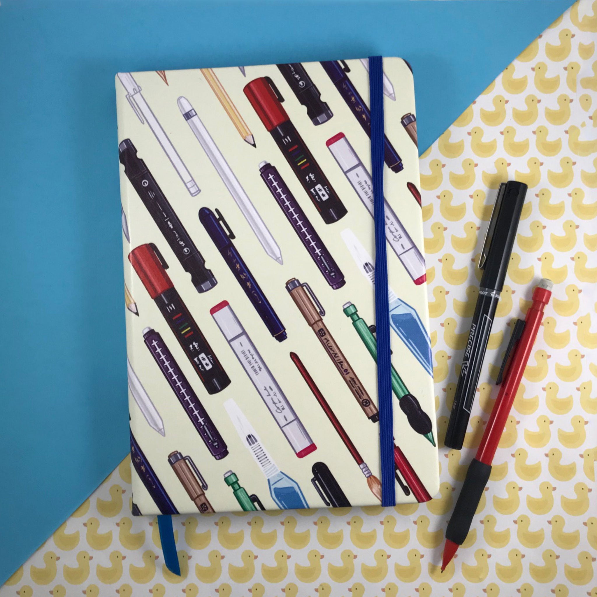 Colored Pencils and Dot Grid Journals